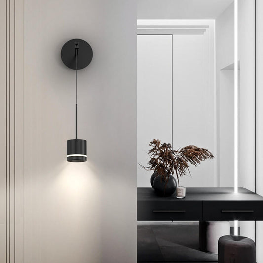 A Wall hanging Modern Black Pendant Light Mounted on a wall in an indoor setting